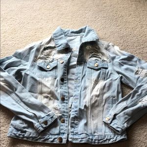 Distressed denim jacket